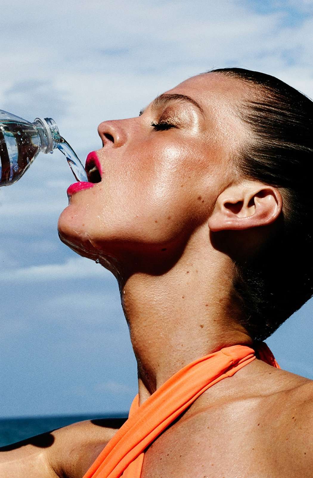 woman-drinking-water-model-sports-bottle