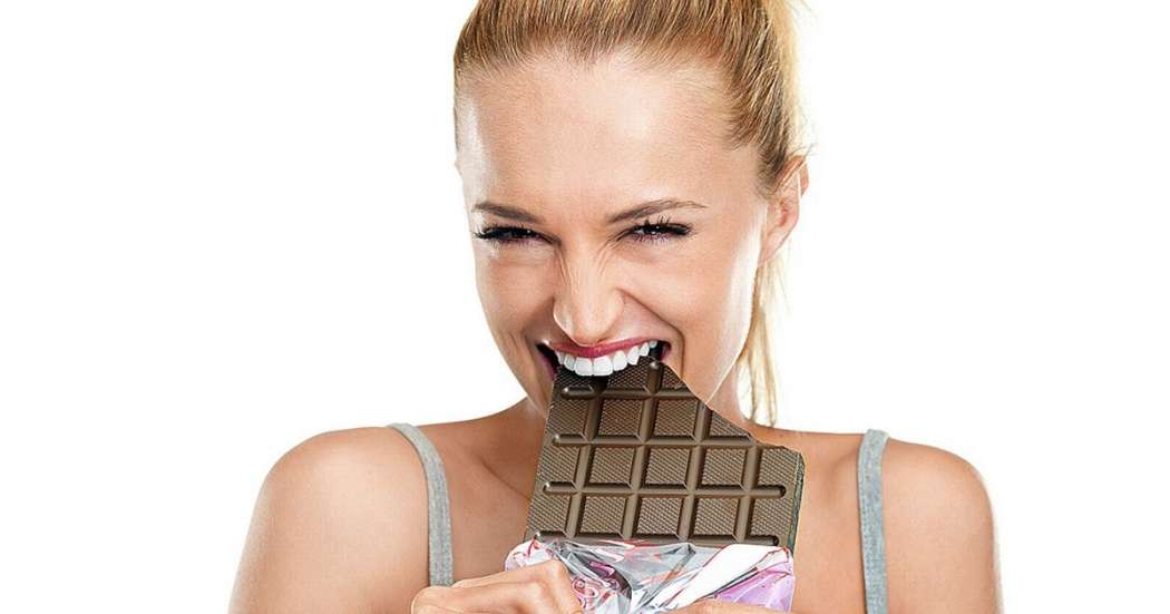Girl-eating-a-chocolate-bar