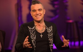 Robbie Williams se je razveselil četrtega otroka