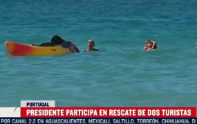 Portugalski predsednik de Sousa je reševati ženski, ki se jima je na morju prevrnil kajak (VIDEO)