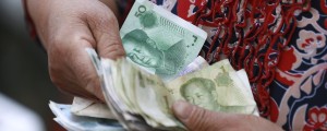 Kitajska za spodbudo gospodarstvu v banki vložila skoraj 100 milijard dolarjev