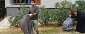 Sirski migranti očistili zanemarjeno sosesko