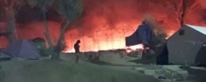 Požar ukrotili, pobegnilo več tisoč migrantov