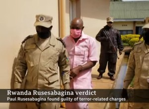 Slavljeni junak 'hotela Ruanda' v domovini velja za terorista