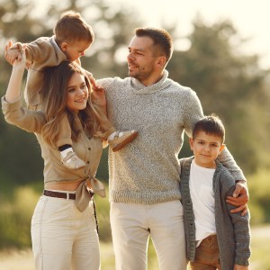 cute-family-playing-summer-field