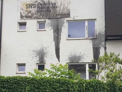 Zmago Jelinčič Plemeniti, fasada, sedež sns, odpadno motorno olje