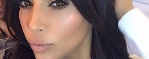 Kim Kardashian in njene prsi navdušujejo svet