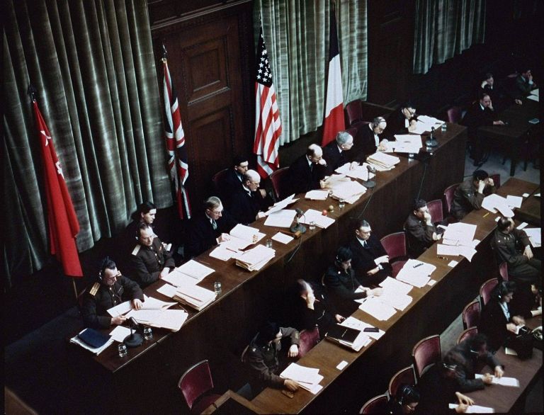 Color_photograph_of_judges'_bench_at_IMT.jpg