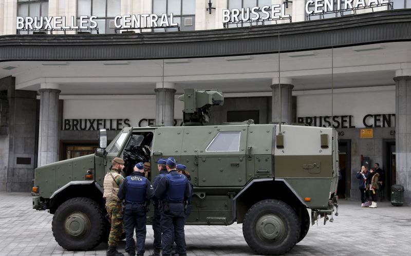 A Belgian soldier and police officers