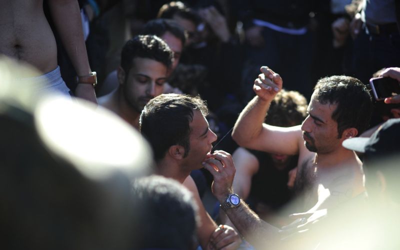migranti protest usta šivanje.jpg