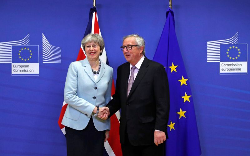 jean-claude juncker, theresa may.jpg