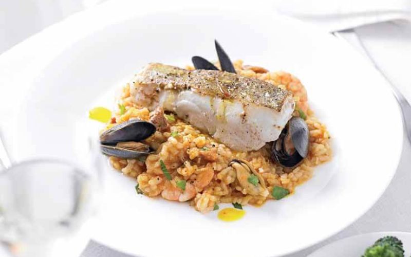 roast cod with paella and saffron olive oilweekend