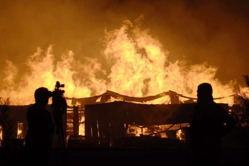 reuters_chile_fire_02Jan12-878x587