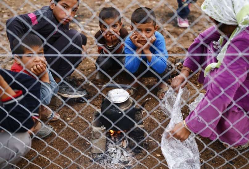 otrok otroci begunci kurdi turcija sirija kobane