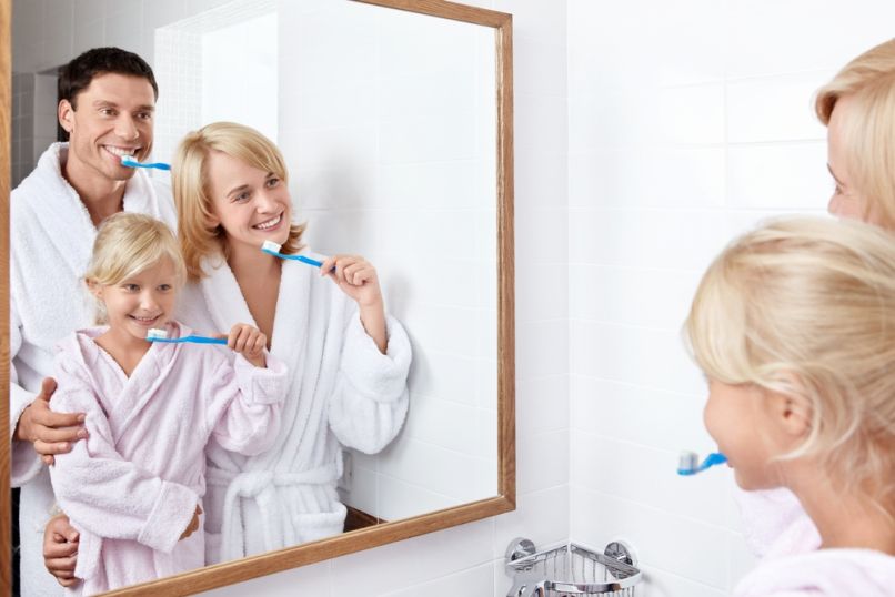 family-tooth-brushing