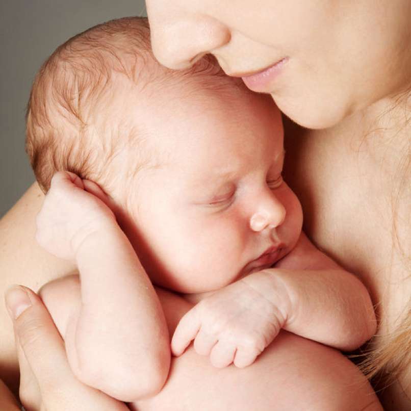mother-snuggling-infant_600x600_shutterstock_93691387