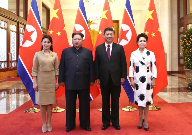 Xi Jinping (2nd R), Peng Liyuan (1st R) meet with Kim Jong Un in Ri Sol Ju
