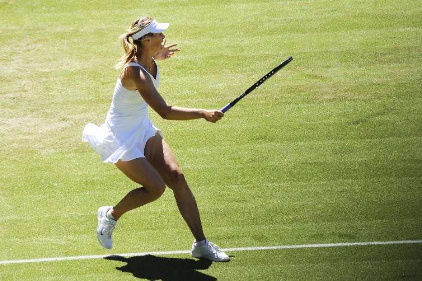Šarapova prvič po 2011 spet v polfinalu Wimbledona