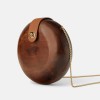 zara okrogla lesena torbica 29-95 eur.jpg