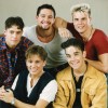Robbie Williams je začel v skupini Take That
