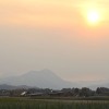 sončni-zahod, dim, požar-na-krasu