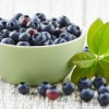 borovnice-blueberry-with-leaves-on-a-wooden-white-board-2022-01-18-23-42-34-utc