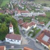 mokronog___levo_za_cerkvijo_grajski_gric__desno_od_cerkve_kulturni_dom__foto_arhiv_omt.jpg
