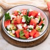 Solata z lubenico, feta sirom, kumarami in meto