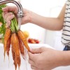 woman-washing-fresh-organic-carrots.jpg