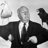 Alfred Hitchcock na promocijski fotografiji za film Ptiči (The Birds, 1963). Mojster suspenza je bil