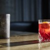 closeup-shot-glass-cocktail-wooden-table.jpg
