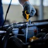 -checking-car-oil-workshop.jpg