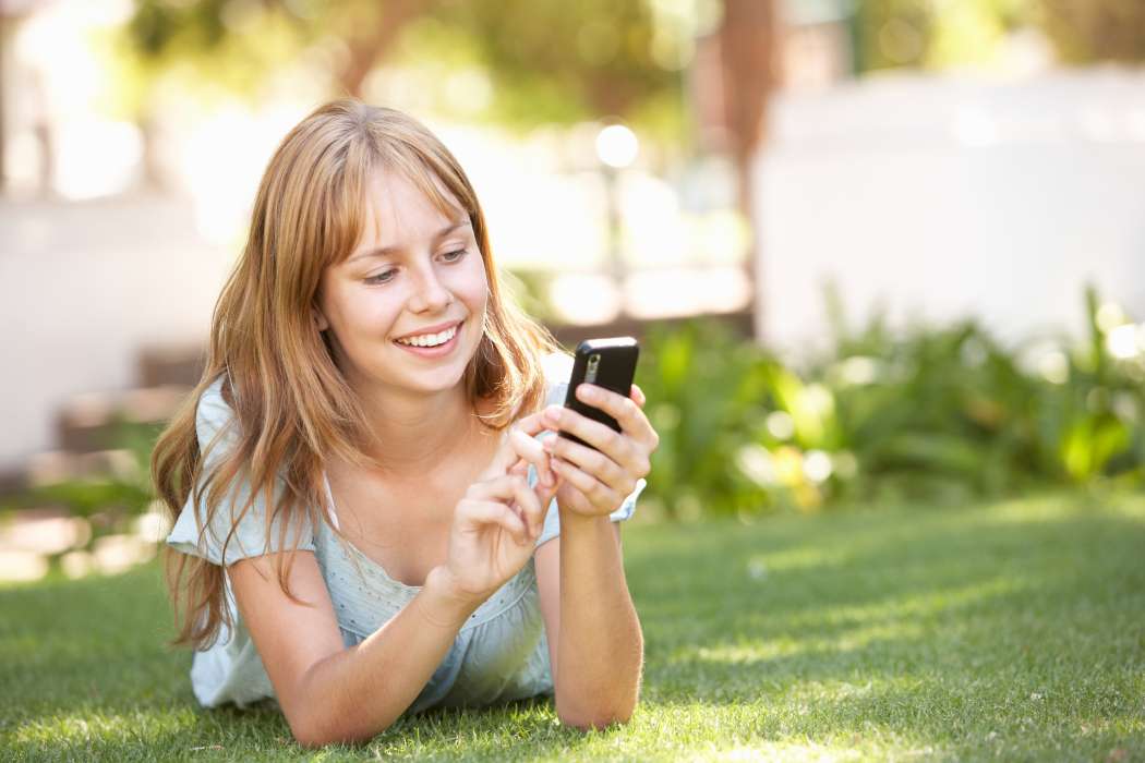 girl-lying-on-grass