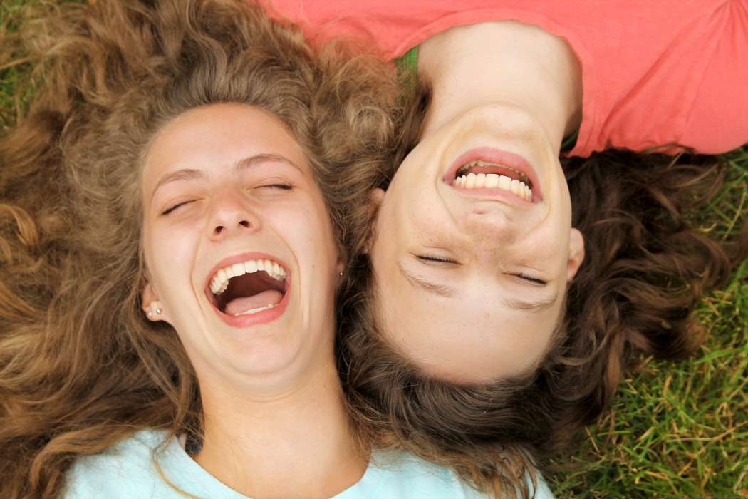 bigstock-Happy-teenagers-friends-lying-52386151