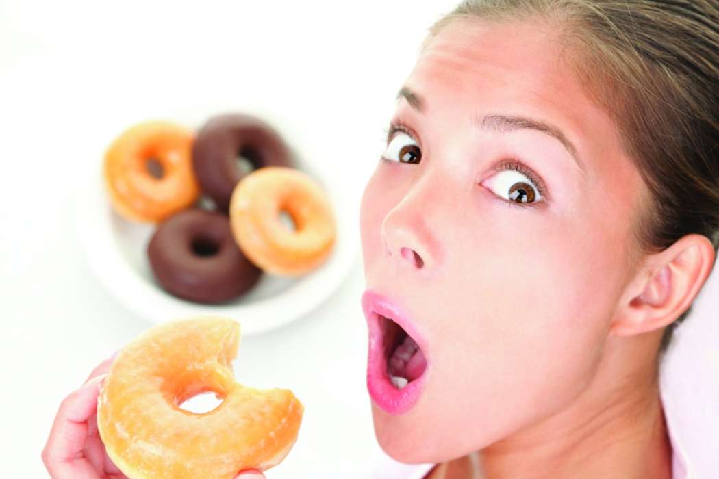 girl-surprise-eating-donut