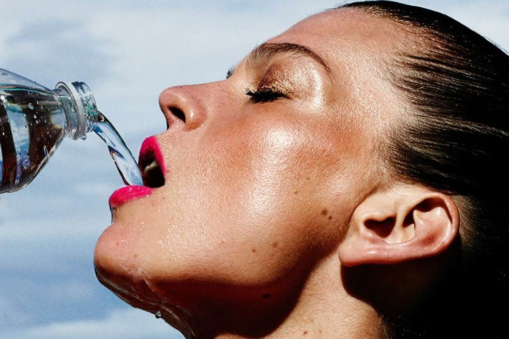 woman-drinking-water-model-sports-bottle