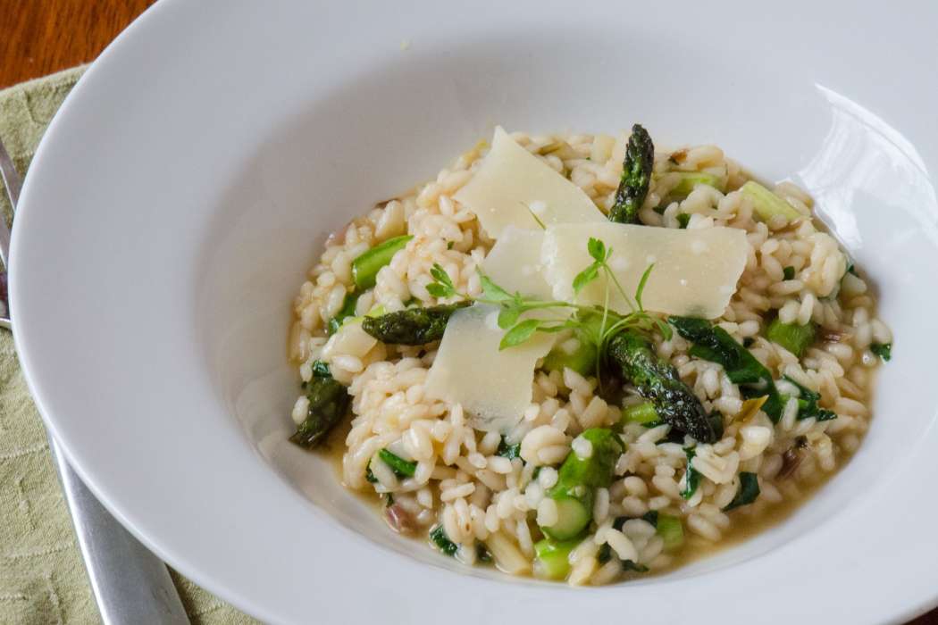 risotto-plated-fork-cycling-tours-italy-dolomites-italiaoutdoors