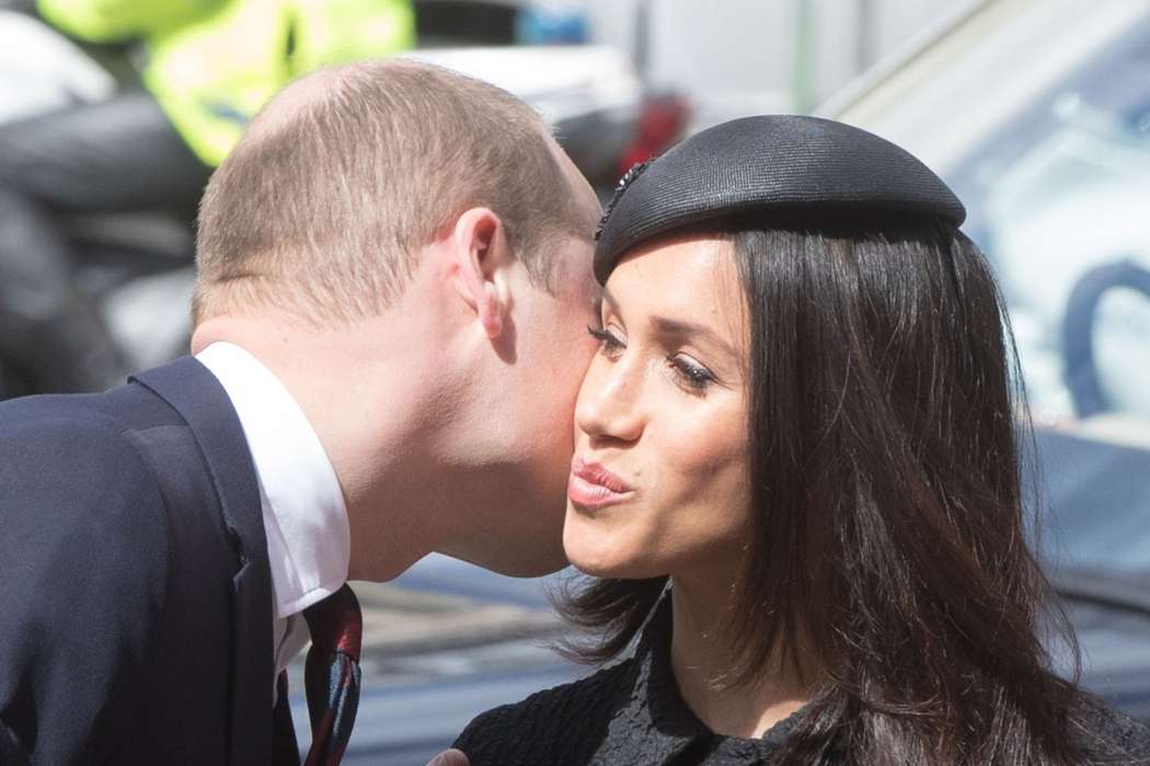 Princ William in Meghan Markle