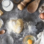 top-view-dough-counter-with-flour-eggs