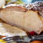 tasty-appetizing-roasted-meat-pork-with-vegetables-christmas-thanksgiving-day-closeup