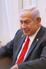 Netanjahu potrdil oboroževanje skupine v Gazi, ki nasprotuje Hamasu