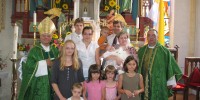 Družina Koprivc ob krstu leta 2011