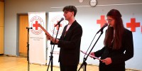 Voditelja David Matjašič in Iza Zupančič