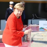 Angela Merkel, berlinski proces, Trst