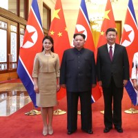 Xi Jinping (2nd R), Peng Liyuan (1st R) meet with Kim Jong Un in Ri Sol Ju