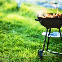 1920_stock-photo-barbecue-grill-with-fire-on-nature-outdoor-close-up-645672055