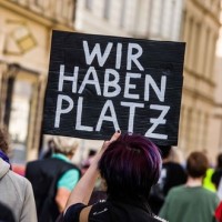 berlin, protest, migranti