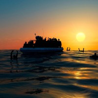 migranti, čoln