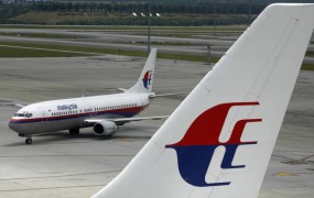 Bančna uslužbenka kradla denar z računov žrtev pogrešanega malezijskega letala