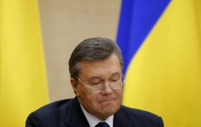 Janukovič iz Rusije: V Kijevu se je zgodil »gangsterski udar«